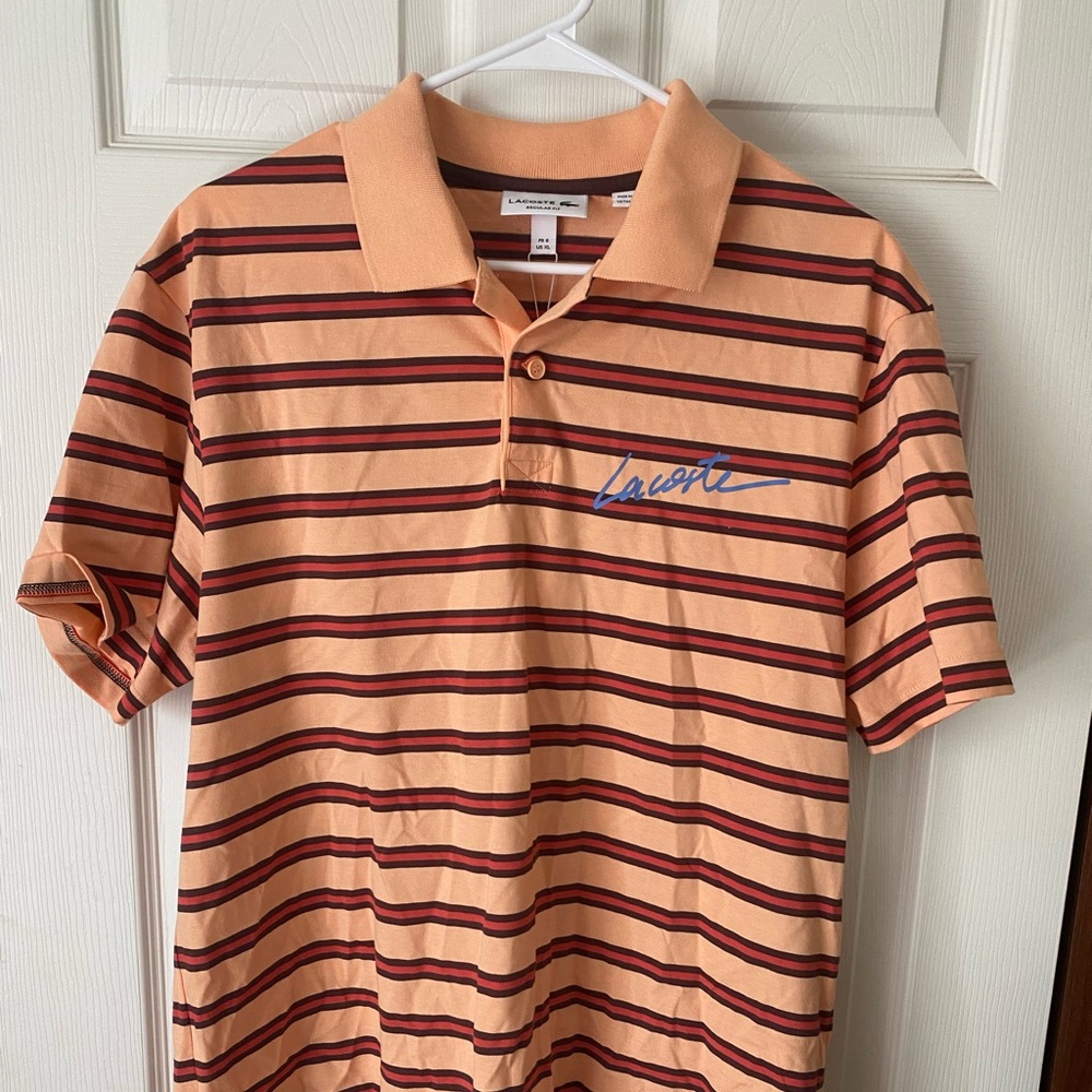 Lacoste salmon colored shirt. Collar shirt.